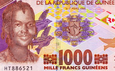 Afrikalı bir kızın portresiyle 1000 gine. Afrika Gine parası. Yakın plan..