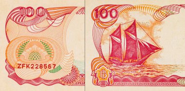 100 rupilik bir Endonezya banknotunun parçası. Endonezya 'nın kağıt parası.