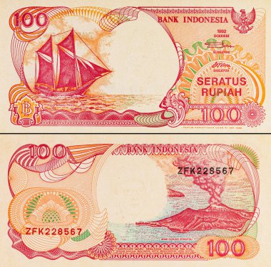 Endonezya 'dan gelen 100 rupiah banknotunun bir parçası, Pinisi Teknesi' ni resmediyor. Endonezya 'dan kağıt para.