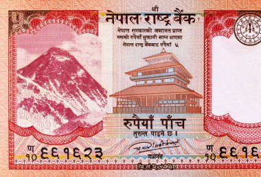 Üzerinde Everest Dağı 'nın resmi olan 5 rupilik Nepal banknotu, tasarım için. Nepal parası