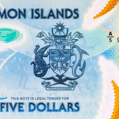 Solomon Adaları 5 Dolar. Polimer banknot parçası 2019 'da çıkarılmış ton balığını gösteriyor. Solomon Adalarının Parası.