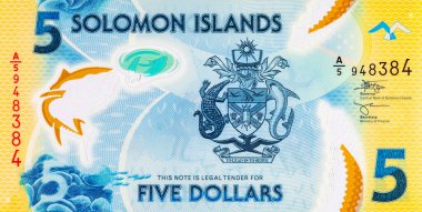 Solomon Adaları 5 Dolar. Polimer banknot parçası 2019 'da çıkarılmış ton balığını gösteriyor. Solomon Adalarının Parası.