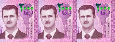 Banknote 2000 Pound, Suriye, Bashar al-Esad 'ın portresiyle. Diktatörün portresi. Suriye 'nin parası.