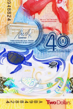 Doğu Karayipler 'e 2 dolar, adaların ve sualtı dünyasının görüntüsüne sahip polimer banknot. Doğu Karayip parası