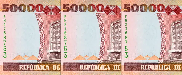 Maputo 'daki Banco de Mocambique binasının görüntüsüne sahip Mozambik 50000 Meticais 2003 banknotu. Mozambik parası