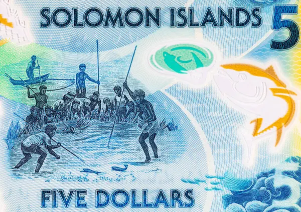 Solomon Adaları 5 Dolar. Polimer banknot, sualtında balık tutan bir adam resmi. Solomon Adalarının Parası.