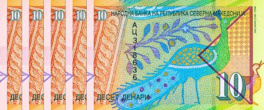 Banknote 'un bir parçası, tavus kuşunun mozaik görüntüsüne sahip Makedonya' yı 10 dinar olarak gösteriyor. Polimer parası. Makedonya 'nın Para Birimi