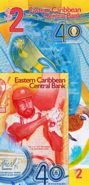 Doğu Karayipler 'e 2 dolar, adaların ve sualtı dünyasının görüntüsüne sahip polimer banknot. Doğu Karayip parası