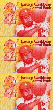 Doğu Karayipler 'e 2 dolar, üzerinde kriket oyuncusu Sir Viv Richards' ın portresi olan hatıra banknotu. Doğu Karayip parası