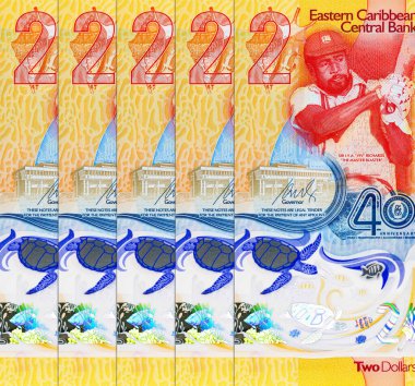 Doğu Karayipler 'e 2 dolar, üzerinde kriket oyuncusu Sir Viv Richards' ın portresi olan hatıra banknotu. Doğu Karayip parası