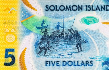Solomon Adaları 5 Dolar. Polimer banknot, sualtında balık tutan bir adam resmi. Solomon Adalarının Parası.