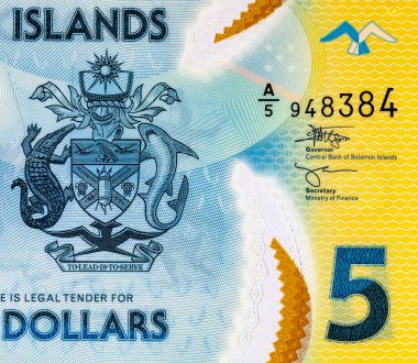 Solomon Adaları 5 Dolar. Polimer banknot parçası 2019 'da çıkarılmış ton balığını gösteriyor. Solomon Adalarının Parası.