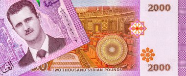 Suriye 'de 2000 Pound' luk banknot Suriye 'de Suriye Parlamentosu' nun görüntüsü var. Suriye 'nin kağıt parası.