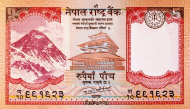 Üzerinde Everest Dağı 'nın resmi olan 5 rupilik Nepal banknotu, tasarım için. Nepal parası