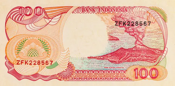 100 rupilik bir Endonezya banknotunun parçası. Endonezya 'nın kağıt parası.