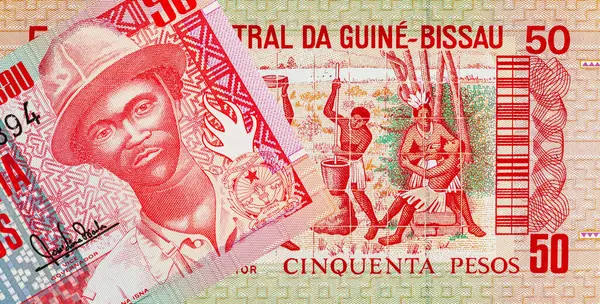 Ulusal kabileleri tasvir eden Gine-Bissau 'nun 50 peso banknotu. Gine-Bissau 'nun kağıt parası..