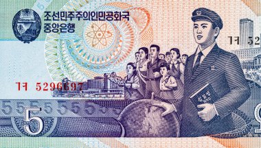 Banknote 5 Kuzey Kore 1998 'de Kim Il-sung Üniversitesi, Mangyongdae Çocuk Sarayı Pyongyang' da ve atom ve nükleer gücün sembolü. Kuzey Kore 'nin parası.