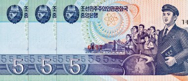 Banknote 5 Kuzey Kore 1998 'de Kim Il-sung Üniversitesi, Mangyongdae Çocuk Sarayı Pyongyang' da ve atom ve nükleer gücün sembolü. Kuzey Kore 'nin parası.