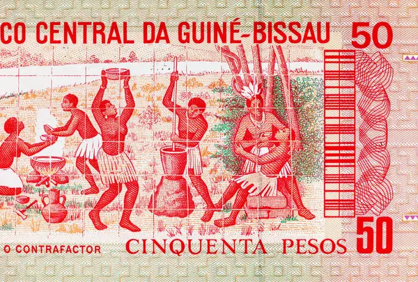 Ulusal kabileleri tasvir eden Gine-Bissau 'nun 50 peso banknotu. Gine-Bissau 'nun kağıt parası..