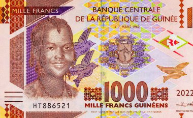 Afrikalı bir kızın portresiyle 1000 gine. Afrika Gine parası. Yakın plan..