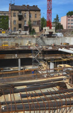 construction site with a foundation pit for a monolithic reinforced concrete skyscraper ...