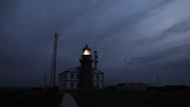 Mysterious Noir Lighthouse Glows Dusk Ocean Shore Closeup — Stock Video