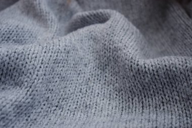 Örülmüş doku arka planı. Dalgalı kumaşı katlar. Arkaplan için makro fotoğraf tekstil dokusu.