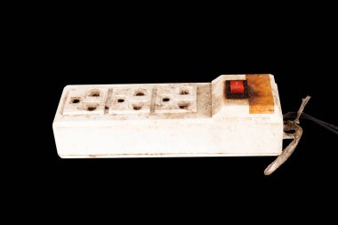 extension socket line cable plug isolated on black background.