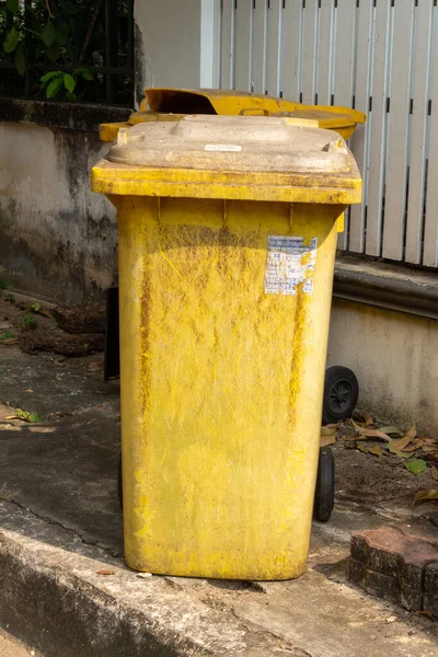 yellow trash can clean dustbin disposal recycling.