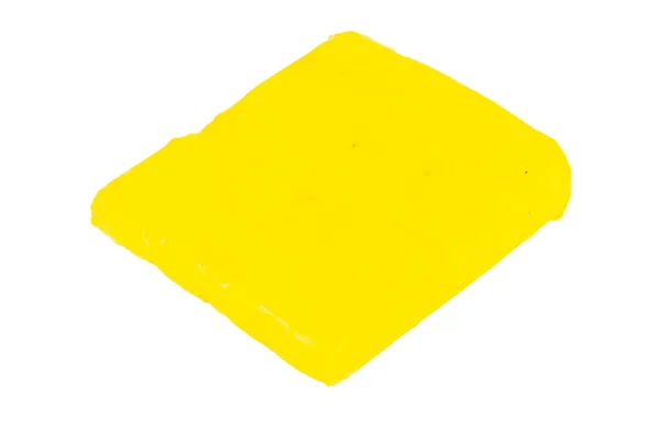 白色背景下孤立的塑料黄色肿块 — 图库照片
