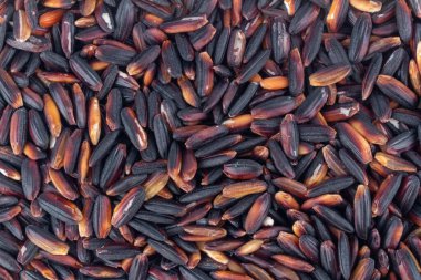 Siyah yapışkan pirinç arkaplan dokusu.