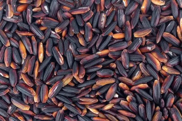 Siyah yapışkan pirinç arkaplan dokusu.