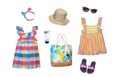 Collage set of girl beach summer clothes isolated. Female kids apparel collection. Child baby fashion clothing outfit. Colorful stylish dresses, hat, shoes, bag wearing.