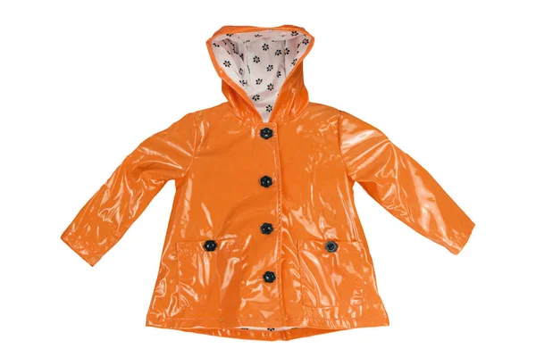 Rain jacket. Close-up of a elegant orange rain jacket isolated on a white background. Clipping path. Girls fashion for rain season. Spring and autumn clothing.