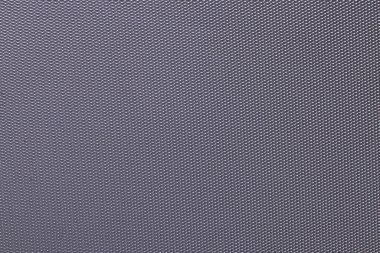 Kusursuz plastik doku arka planı. Kozmetik poşetin gri metalik yüzeyindeki bir detayı yakından çek. Güzel zemin. Makro.