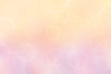 Soyut bulanık bahar ışığı hassas pastel mavi turuncu bokeh arkaplan dokusu parlak yumuşak renk çemberleri. Kart konsepti. Güzel arkaplan illüstrasyonu.