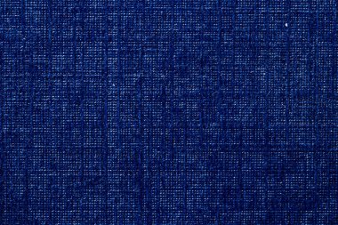 Kusursuz karton kutu dokusu arka planı. Hediye kutusunun koyu mavi yüzeyindeki bir detayın yakın çekimi. Güzel zemin. Makro.