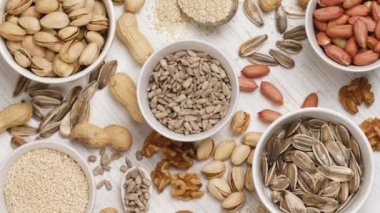 Mix of seeds and nuts: sunflower seeds, walnuts, peanuts, pistachios, sesame seeds.