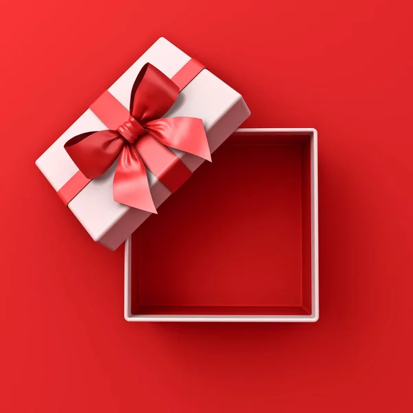 白のプレゼント箱を開くか 赤いリボンと弓で結ばれた現在のボックスの上のビューは 影の最小概念的な3Dレンダリングと赤の背景に隔離された — ストック写真