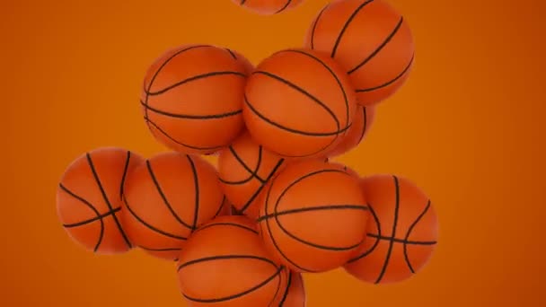 三维抽象动画 在橙色背景下飞行 悬浮的经典橙色篮球运动 — 图库视频影像