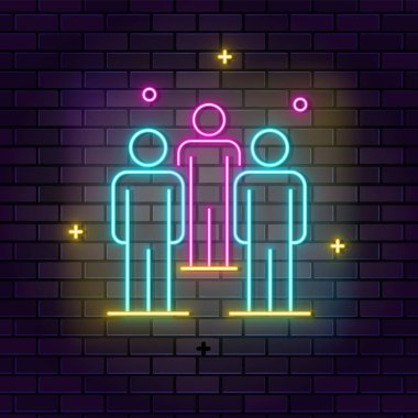 Grup, insanların neon ikonu. Koyu tuğla duvar arkaplanındaki eğitim neon simgesi.
