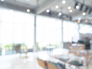 Soyut bulanık modern çalışma alanı arka planı, beyaz iç ofis ya da pencereli çalışma alanı ve fotokopi alanı olan ışık. Reklam ve iş sunumu için bulanık arkaplanlar.