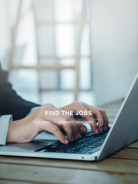 Job or career search, employment, seek for vacancy or work position concept, Find the job, text with searching bar appear while business people using laptop computer with copy space, vertical style.