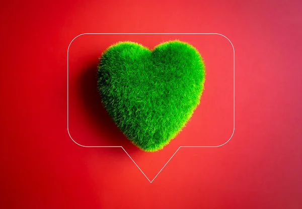 Green heart ball in speech bubble on red background. Green grass heart shape, donation online. Environment and sustainable plant protection, Eco-friendly, world care, and Happy Earth Day concept.