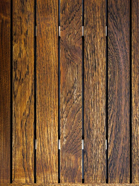 Empty wood plank top desk texture for background, above view. Closeup grunge brown wooden oak table. Empty vintage natural rustic wood plank background, vertical style.