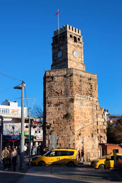 stock image Antalya, Turkey - February 11, 2022: Clock Tower in Kaleici, the Old Town of Antalya, a popular resort city and tourist destination 