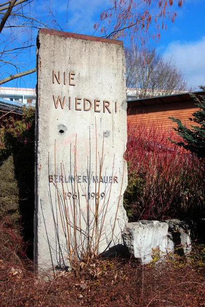 stock image Reichenbach-im-Vogtland, Germany - March 10, 2023: Piece of Berlin Wall with words 