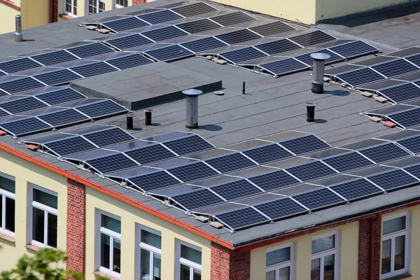 Solar panels on a flat roof of a building