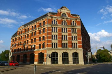 Zeitz, Germany - September 20, 2024: The historic factory building of Ernst Albert Naether, a Zeitz-born entrepreneur and pioneer in the baby carriage industry. clipart