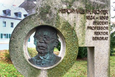 Freiberg, Germany - March 16, 2024: Monument to Hieronymus Theodor Richter, a German chemist who co-discovered with Ferdinand Reich the element indium in 1863 in Freiberg clipart